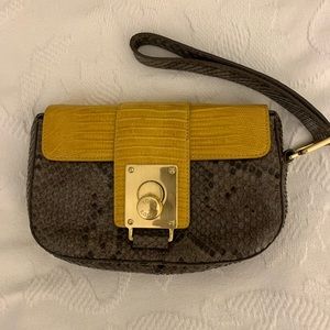 Amazing python Tod’s clutch, almost new
